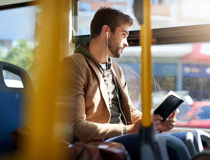 Image of person travelling on a public bus.